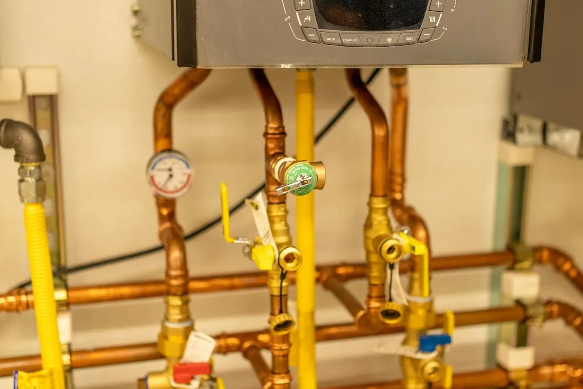 Licensed technician providing Water Heater Installation for a homeowner in Mapleton